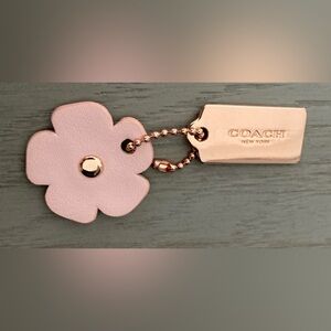 Coach pink flower bag tag
